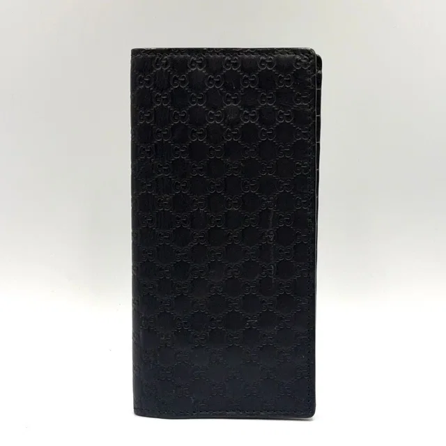Gucci Micro Guccissima Leather Black Bifold Wallet in Black Leather from The Reluxe