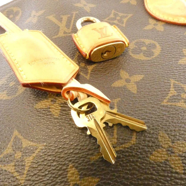 Louis Vuitton Lockit Chain Monogram Bag in Brown Canvas from LuxUness, photo 3 of 8