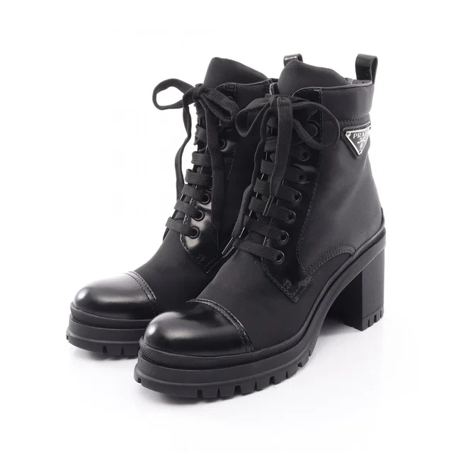 Prada Boots Re-Nylon Triangle Logo Lace Up Nylon Leather in Nylon from The Reluxe