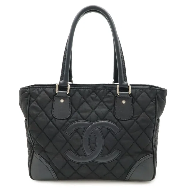 Chanel Paris New York Klein Quilted CC Logo Tote Shoulder Bag Nylon Canvas Black in Black Canvas from The Reluxe