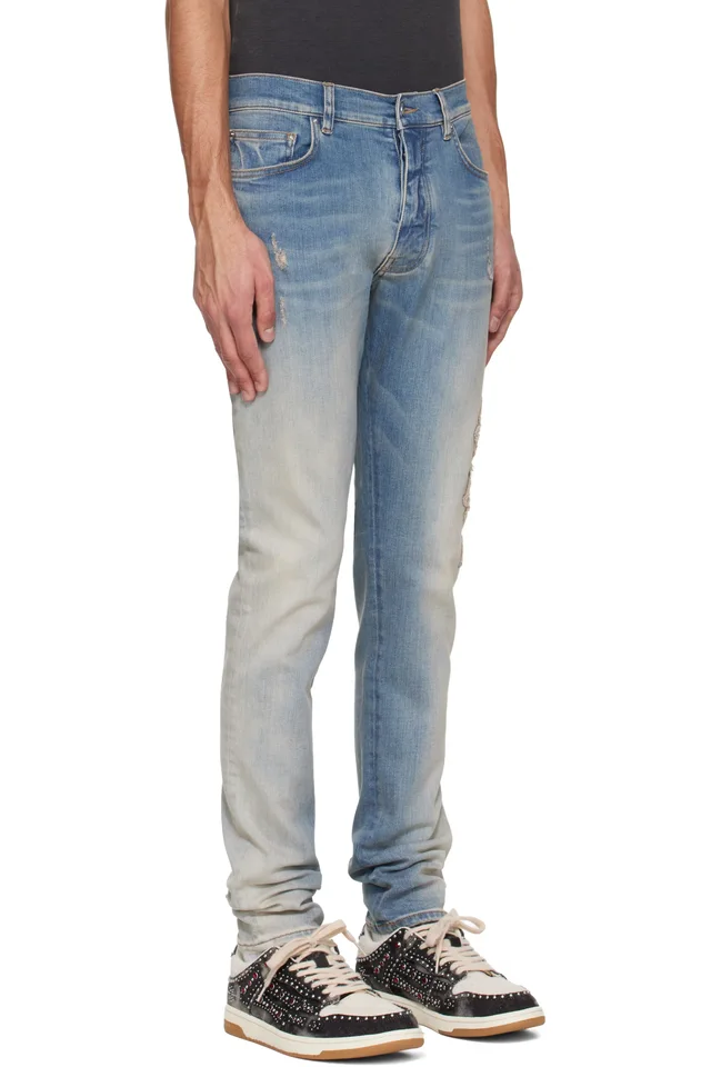 AMIRI Blue MA Quad Applique Skinny Jeans, photo 2 of 4 from SSENSE