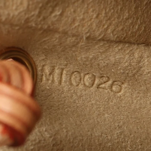 Louis Vuitton Monogram Pochette Cancun Brown Bag in Brown Coated canvas from A Retro Tale, photo 8 of 9
