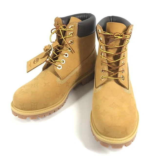 Louis Vuitton Boots Ankle Beige in Beige Calfskin from The Reluxe