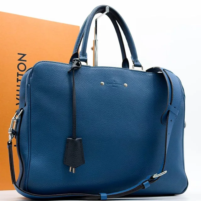 Louis Vuitton Alma MM Taurillon Briefcase 2-Way from The Reluxe