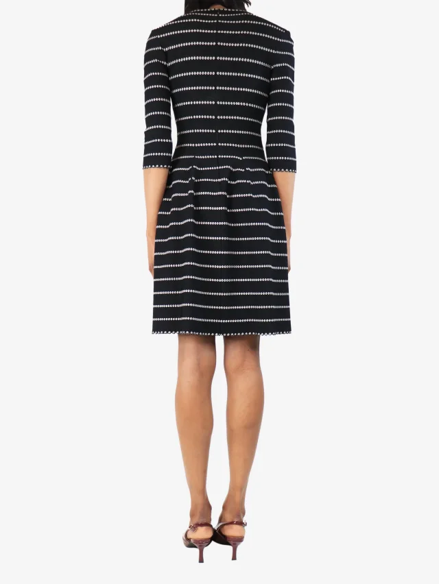 Alaïa Black and white v-neck mini dress - size UK 4 in Black from Sign of the Times, photo 2 of 3