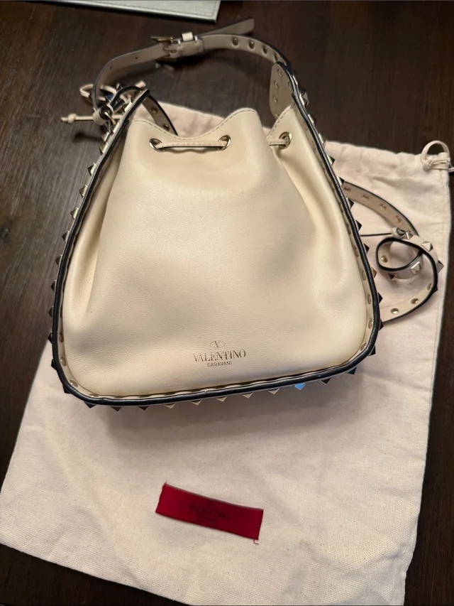 Valentino Garavani Cream Leather Rockstud Drawstring Shoulder Bag in White Leather from Poshmark