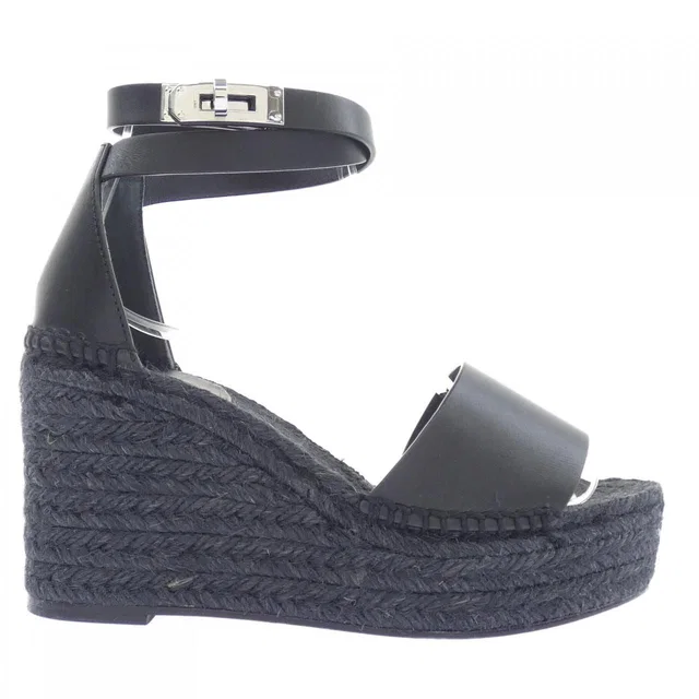 Hermès Tipoli Kelly Buckle Sandals from The Reluxe