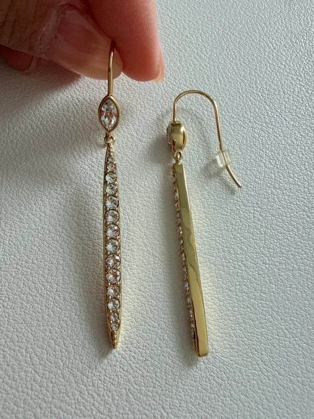 Swarovski Gold Tone Linear Crystal Drop Earrings in gold|white from Poshmark
