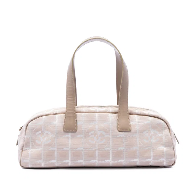 Beige Chanel New Travel Line Nylon Handbag in Beige Nylon from Designer Revival